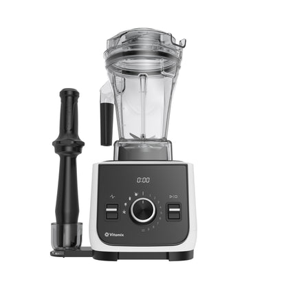 Vitamix Ascent X2 countertop blender with a clear container, black and white base, digital display, and a black accessory attachment on a white background.